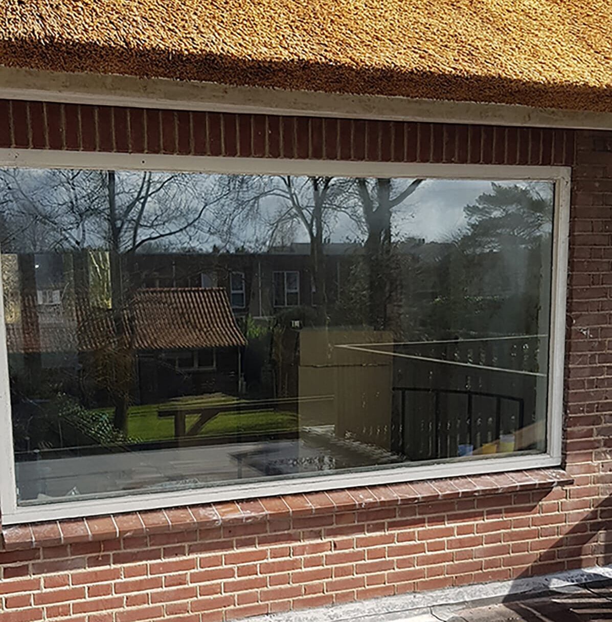 Nieuwe kozijnen boerderij met rietendak